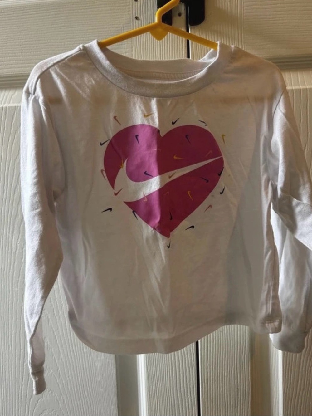 Nike White Long-Sleeve Tee with Pink Heart Swoosh